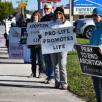 Prayer warriors from Resurrection and St. Joseph Parishes in Lakeland stand vigil in prayer in front of an abortion clinic on Ash Wednesday, the first day of 40 Days for Life photo