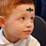 Johnny, a kindergarten student at St. James Cathedral School, received ashes at the school’s Ash Wednesday Mass on March 1 photo