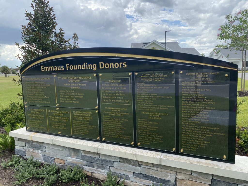 Emmaus Building Blessing Ceremony Founding Donors sign